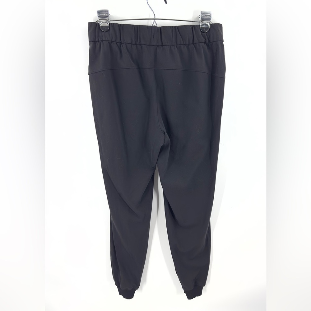 Lululemon On The Fly Joggers Womens Size 6 Black Athletic Pants Athleisure Yoga - Picture 6 of 13